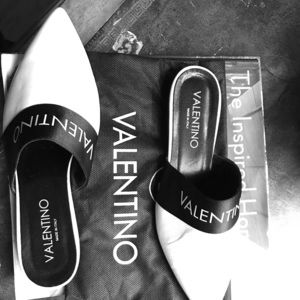 Brand new size 9 Valentino slides. $450